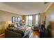 Comfortable living room with hardwood floors, seating, and ocean view at 8000 Palmetto Dr # 505, Isle of Palms, SC 29451