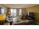 Relaxing living room with hardwood floors, comfortable seating, and ocean view at 8000 Palmetto Dr # 505, Isle of Palms, SC 29451