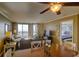 Spacious living room with hardwood floors, comfy seating, and ocean views at 8000 Palmetto Dr # 505, Isle of Palms, SC 29451