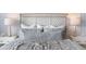 Serene main bedroom with luxurious bedding and stylish nightstands featuring elegant lamps at 108 Maritime Way, Summerville, SC 29485