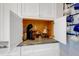 Custom kitchen cabinet with small appliances at 120 Charleston Blvd, Isle of Palms, SC 29451