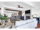 Charming living room featuring a fireplace, exposed brick, and stylish furnishings at 120 Charleston Blvd, Isle of Palms, SC 29451