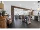 Spacious open concept layout with brick accents and seamless flow between rooms at 120 Charleston Blvd, Isle of Palms, SC 29451