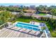 Aerial view of a backyard pool with a sun deck and tropical landscaping at 120 Charleston Blvd, Isle of Palms, SC 29451