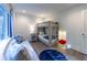 Bright bedroom featuring a comfy sofa, a bunk bed, and a cute red reading nook at 1365 Dunlin Court, Share C, Kiawah Island, SC 29455