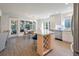 Open concept kitchen featuring center island with seating and dining area with outdoor views at 1365 Dunlin Court, Share C, Kiawah Island, SC 29455