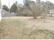 Expansive backyard perfect for outdoor enjoyment and relaxation with a wooden fence for privacy at 1382 Doctor Evans Rd, Moncks Corner, SC 29461