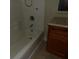 The bathroom features a white tub/shower and wooden vanity at 1382 Doctor Evans Rd, Moncks Corner, SC 29461