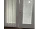 Close up on the door that features white trim and glass paneled windows at 1382 Doctor Evans Rd, Moncks Corner, SC 29461