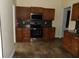 Nice kitchen with stainless steel appliances, custom cabinets, and a tile floor at 1382 Doctor Evans Rd, Moncks Corner, SC 29461