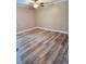 Bright bedroom with modern flooring, offering a clean and simple design for a comfortable and peaceful rest at 1402 Camp Rd # 15H, Charleston, SC 29412