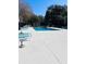 Community pool with many lounge chairs surrounding the deck at 1402 Camp Rd # 15H, Charleston, SC 29412
