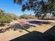 Community tennis court surrounded by mature trees at 1402 Camp Rd # 15H, Charleston, SC 29412