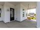 Inviting front porch with swing and stylish curb appeal creating a relaxing outdoor space at 144 Maritime Way, Summerville, SC 29485