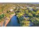 Aesthetic aerial view of a home near a lake and golf course within a vibrant community at 16 Twin Oaks Lane Ln, Isle of Palms, SC 29451