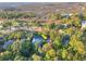 Aerial view of a waterfront home near a golf course and a marshland in a neighborhood at 16 Twin Oaks Lane Ln, Isle of Palms, SC 29451