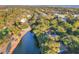 Aesthetic aerial view of a home near a lake and golf course within a vibrant community at 16 Twin Oaks Lane Ln, Isle of Palms, SC 29451