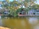 Charming waterfront homes with screened porches and beautiful landscaping at 16 Twin Oaks Lane Ln, Isle of Palms, SC 29451