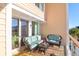 Relaxing balcony featuring comfortable seating and scenic neighborhood views at 1608 Marsh Harbor Ln # C, Mount Pleasant, SC 29464