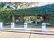 Charming community kiosk featuring a covered wooden structure and manicured landscaping at 1608 Marsh Harbor Ln # C, Mount Pleasant, SC 29464