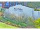 Stone Marsh Harbor sign with lush, ornamental landscaping at Toler's Cove at 1608 Marsh Harbor Ln # C, Mount Pleasant, SC 29464