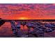 Picturesque harbor view showcasing boats reflecting colorful sunset sky at 1608 Marsh Harbor Ln # C, Mount Pleasant, SC 29464