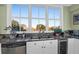 Kitchen sink with stainless appliances and a bright window view at 1608 Marsh Harbor Ln # C, Mount Pleasant, SC 29464