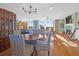 Elegant living and dining area featuring hardwood floors and waterfront views at 1608 Marsh Harbor Ln # C, Mount Pleasant, SC 29464