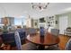 Bright and airy living room with hardwood floors, a fireplace, and scenic views at 1608 Marsh Harbor Ln # C, Mount Pleasant, SC 29464