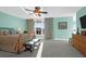 Bright, spacious main bedroom featuring a ceiling fan, large window, and light walls at 1608 Marsh Harbor Ln # C, Mount Pleasant, SC 29464