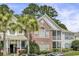Charming multi-story condo with brick facade and manicured landscaping at 1652 Camfield Ln, Mount Pleasant, SC 29466