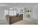 Spacious living room with vaulted ceilings, fireplace, and modern decor at 1652 Camfield Ln, Mount Pleasant, SC 29466