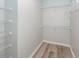 Organized closet with white wire shelving and wood-look floors at 1712 Chatelain Way, Mount Pleasant, SC 29464