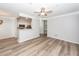 Living room showcasing an open floor plan with a view to the kitchen and entryway at 1712 Chatelain Way, Mount Pleasant, SC 29464