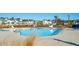 Community pool is surrounded by lush landscaping and has clear blue water at 1714 Banning St, Mount Pleasant, SC 29466