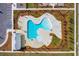 Aerial view of community pool featuring unique shape, splash pad and ample seating at 1714 Banning St, Mount Pleasant, SC 29466