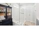 Modern shower with a glass door, white subway tile, and bench, offering a clean and stylish bathing space at 1714 Banning St, Mount Pleasant, SC 29466
