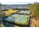 Aerial view of tennis courts surrounded by lush green landscaping at 1714 Banning St, Mount Pleasant, SC 29466