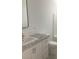 Bathroom featuring modern vanity with granite countertop, white cabinetry, and a new toilet at 183 Waverly Rd, Walterboro, SC 29488