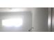 Bathroom with a shower head and bright, natural light streaming through the window at 183 Waverly Rd, Walterboro, SC 29488