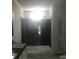 Modern bathroom featuring a glass-enclosed shower with dark tiling and a sleek vanity at 183 Waverly Rd, Walterboro, SC 29488