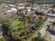An aerial view reveals a neighborhood property with mature trees offering shade and natural beauty at 222 E Main St, Moncks Corner, SC 29461