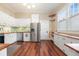 Bright kitchen with stainless steel appliances, wood countertops, and ample cabinet space provides a functional, stylish cooking area at 222 E Main St, Moncks Corner, SC 29461
