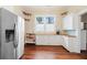 Bright kitchen with stainless steel appliances, wood counters, and ample storage space offers both style and functionality at 222 E Main St, Moncks Corner, SC 29461