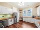 Well-lit kitchen featuring stainless steel appliances, wooden countertops, and ample storage is perfect for cooking and entertaining at 222 E Main St, Moncks Corner, SC 29461