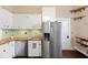 Kitchen featuring stainless steel refrigerator, dishwasher, sink and butcher block countertops at 222 E Main St, Moncks Corner, SC 29461