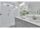 Bathroom featuring a double vanity with framed mirrors, tiled shower and glass door at 232 O'Malley Dr, Summerville, SC 29483