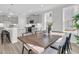 Open floor plan featuring an inviting dining area and a modern kitchen with stainless steel appliances at 232 O'Malley Dr, Summerville, SC 29483