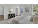 Bright main bedroom featuring a gray side table with decor, a gray cabinet, and natural light at 232 O'Malley Dr, Summerville, SC 29483