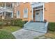 Inviting front entrance with well-manicured landscaping and a decorative wreath at 234 Rutledge Ave # D, Charleston, SC 29403